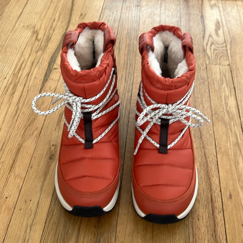 The North Face red winter boots